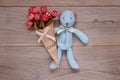 Stock photography flat lay plank table template blue bear doll holding rose flower Royalty Free Stock Photo