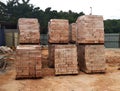 Stock pile of clay brick on wooden pallets stacked at the construction site. Royalty Free Stock Photo