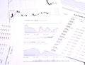 Stock quotes and charts on paper Royalty Free Stock Photo