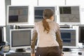 Stock Trader Examining Computer Monitors