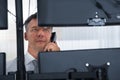 Stock Trader Looking At Multiple Computer Screens Royalty Free Stock Photo