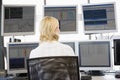 Stock Trader Looking At Multiple Monitors Royalty Free Stock Photo