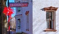 Stockade Historic District street sign decorated with red and white for Christmas