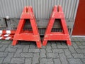 Stocked parts of construction barrier looking like Anonymous Alcoholics sign