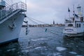 Stockholm - 02/06/2017: boats with fake plastic shark moored in the frozen lake leading to the Baltic Sea