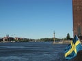 stockholm, the capital city of sweden, photo from a boat with swedish flag Royalty Free Stock Photo