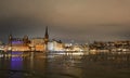 Riddarholmen island and the frozen Riddarfjarden at night. Stockholm. Sweden Royalty Free Stock Photo