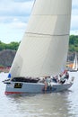 STOCKHOLM - JUNE, 30: Sailboat DataCom with crew close to shore Royalty Free Stock Photo