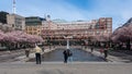 Stockholm, Kungstradgarden Sweden - 05. 03. 2021: Famous landmark. Sakura blossom in the central park of Stockholm. Lots of people Royalty Free Stock Photo