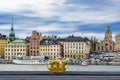 Stockholm old town Gamla Stan cityscape and Royal crown, Sweden