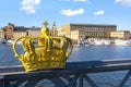 Stockholm old town Gamla Stan cityscape and Royal crown, Sweden