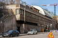 street view of old concrete subway station building entrance with incidental people in Stockholm. Royalty Free Stock Photo