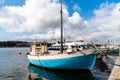 Old blue fishing boat moored in the harbour of Stockholm Royalty Free Stock Photo