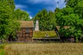 Traditional old houses and a wheat field in Skansen Stockholm Sw Royalty Free Stock Photo