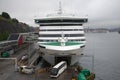 A tourist bus leaves the hold of a sea cruise ferry. The terminal of the company `Viking Line`