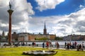 STOCKHOLM, SWEDEN - AUGUST 19, 2016: Tourists walk and visit Stockholm City Hall ( Stadshuset ) and View of Gamla Stan in Royalty Free Stock Photo