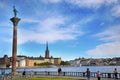 STOCKHOLM, SWEDEN - AUGUST 20, 2016: Tourists walk and visit Stockholm City Hall ( Stadshuset ) and View of Gamla Stan in Royalty Free Stock Photo