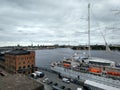 Stockholm, Sweden. August 21, 2017: view of the embankment, brick buildings, the city and a large ship from the Fyalgatan