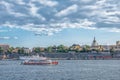 Wiev on coastline of Sodermalm island with touristic red boat Royalty Free Stock Photo