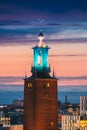 Stockholm, Sweden. Close View Of Famous Tower Of Stockholm City Hall. Popular Destination Scenic In Sunset Twilight Dusk