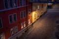 Stockholm, Sweden. Cobbled street in Sodermalm. Color street with cobblestone road, streetlight. Narrow street. Royalty Free Stock Photo