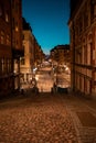 Stockholm, Sweden. Cobbled street in Sodermalm. Color street with cobblestone road, streetlight. Narrow street. Royalty Free Stock Photo