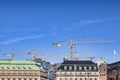 Stockholm Sweden, Cranes Working above Rooftops