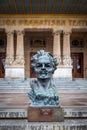 Famous historical art and theater building The Royal Dramatic Theater. Statue bust of the famous writer Strindberg in the front.