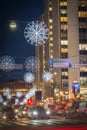 Night view over Sveavagen, a central Stockholm street, decorated with Christmas lights during holiday season