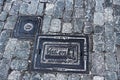 An old hatch in the pavement of Stockholm