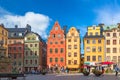 Stockholm, Sweden - July, 2018: Colorful facade of the houses in Stortorget Square Gamla Stan. Stockholm, Sweden with tourists at Royalty Free Stock Photo