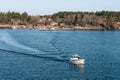 Stockholm, Sweden - May 1, 2019 : Baltic sea landscape, small boat near shore line. Local privat transport, tourism concept,