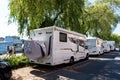 Stockholm, Sweden, 08.04.2021: Parking for caravan travel trailer RV motor home camper. Car vehicle journey. Tourism Summer Royalty Free Stock Photo