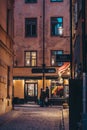 Stockholm Sweden People walking on the narrow streets of the old part of city at evening Royalty Free Stock Photo
