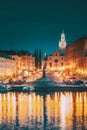 Stockholm, Sweden. Scenic Famous View Of Embankment In Old Town Of Stockholm In Night Lights. Great Church Or Church Of Royalty Free Stock Photo