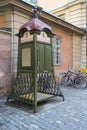 Old wooden telephone box in Stockholm