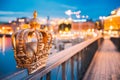 Stockholm, Sweden. Skeppsholmsbron - Skeppsholm Bridge With Its Famous Golden Crown In Night Lights. Famous Popular