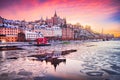 Stockholm, Sweden. Sunset with Mariaberget downtown and frozen Lake Malaren