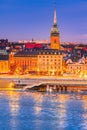 Stockholm, Sweden. Sunset over Gamla Stan and frozen Lake Malaren