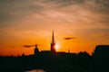 Stockholm, Sweden. Sunset Sun Shine Through Dark Silhouette Of Riddarholm Church In Stockholm Skyline. Scenic View Of Royalty Free Stock Photo