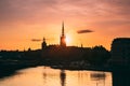 Stockholm, Sweden. Sunset Sun Shine Through Dark Silhouette Of Riddarholm Church In Stockholm Skyline. Scenic View Of Royalty Free Stock Photo
