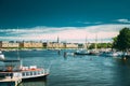 Stockholm, Sweden. Touristic Pleasure Boats Moored Near Piers In Sunny Summer Day Royalty Free Stock Photo