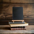StockImage Back to school concept small chalkboard and a stack of books