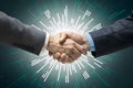 StockImage Closeup business people shaking hands on abstract background, symbolizing transactions and agreements