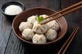 StockImage Traditional Korean Mandu dumplings presented elegantly with chopsticks