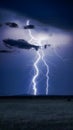 StockPhoto Lightning bolt strikes large cloud dramatically in expansive sky Royalty Free Stock Photo