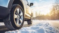 stockphoto, Winter tire. SUV car on snow road. Tires on snowy highway detail. close up view. Space for text.