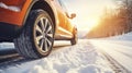 stockphoto, Winter tire. SUV car on snow road. Tires on snowy highway detail. close up view. Space for text.