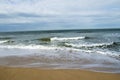 Stoem at the sea wave and cloudy sky