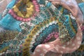 Stole in printed fabric with floral and abstract designs